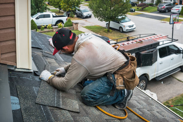 Professional Roofing technician working in Lake, MI